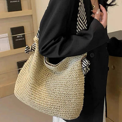 beige boho woven carryall tote bag with contrast-striped straps